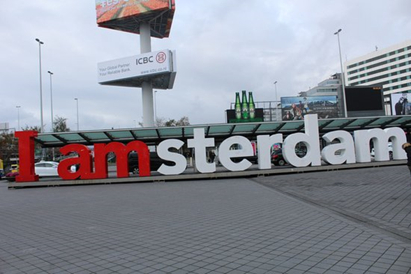 Iamsterdam name board in red and yellow